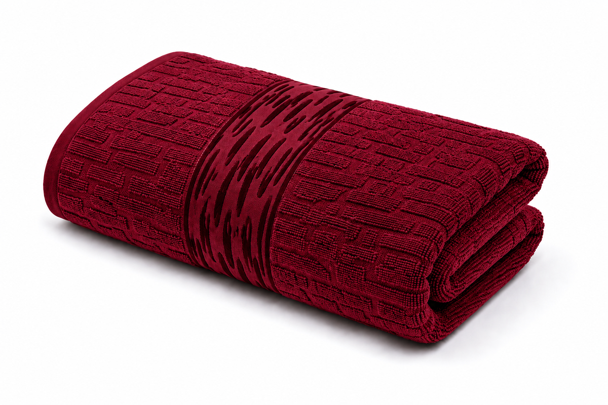 Burgundy red textured bath towel with decorative woven pattern